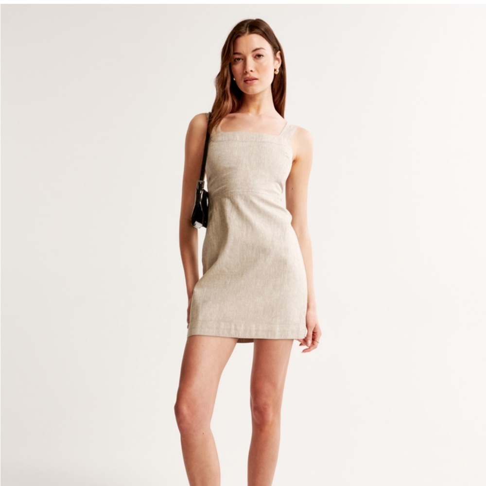 Brand new mini dress never worn. X small petite